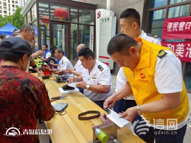 浓浓端午情 信新相映便民服务大集走进紫荆苑社区